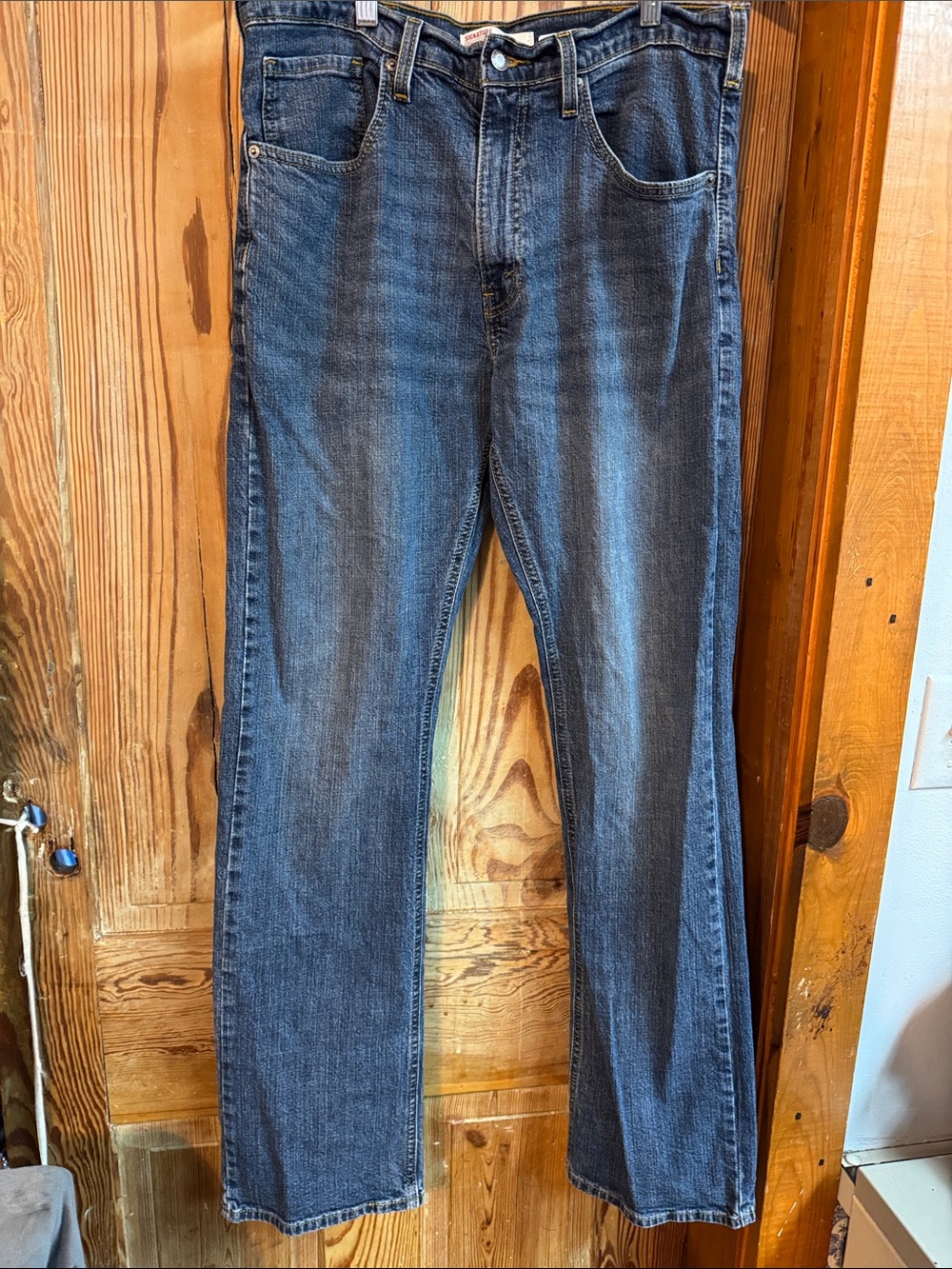 Men's Classic signature Levi Strauss boot cut Fit med Blue Jeans 34x34
